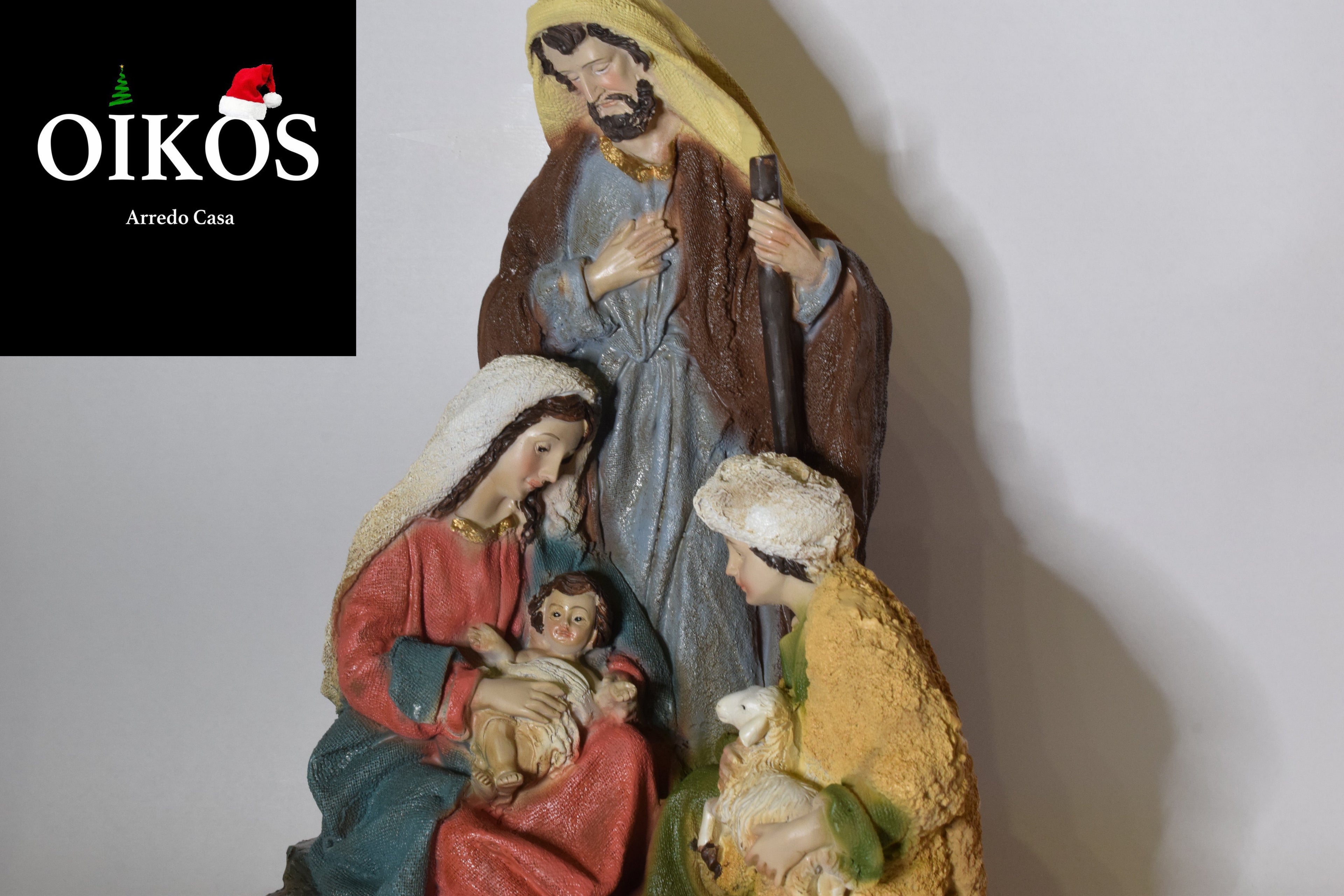 Natività con pastorello in resina dipinta h. 24 cm