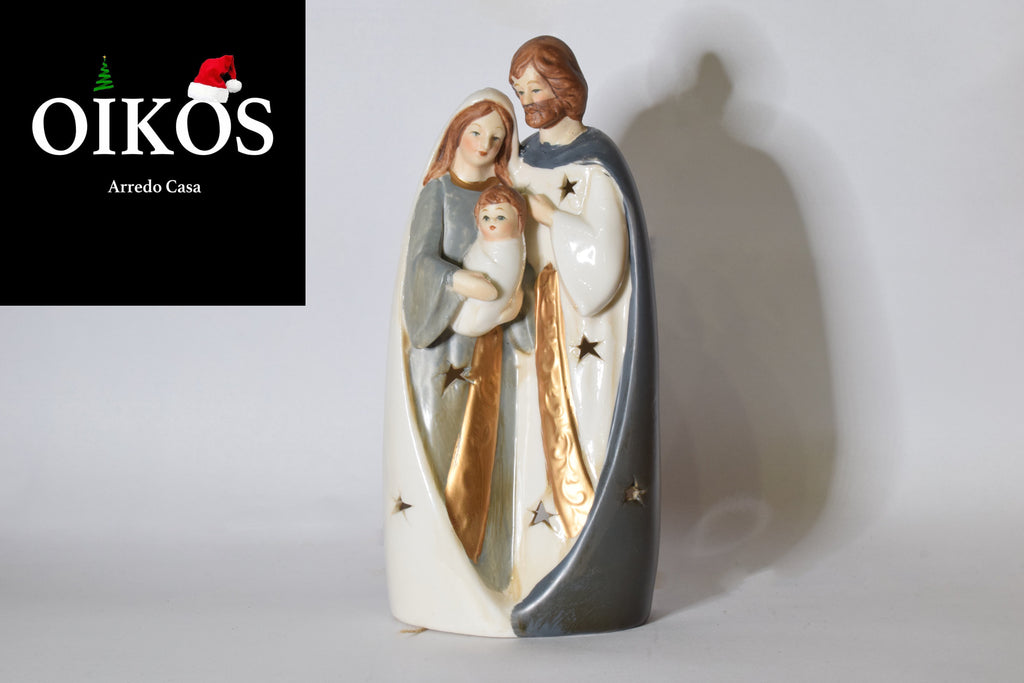 Natività in ceramica h. 19 cm dipinta con fori a stella e lumino interno