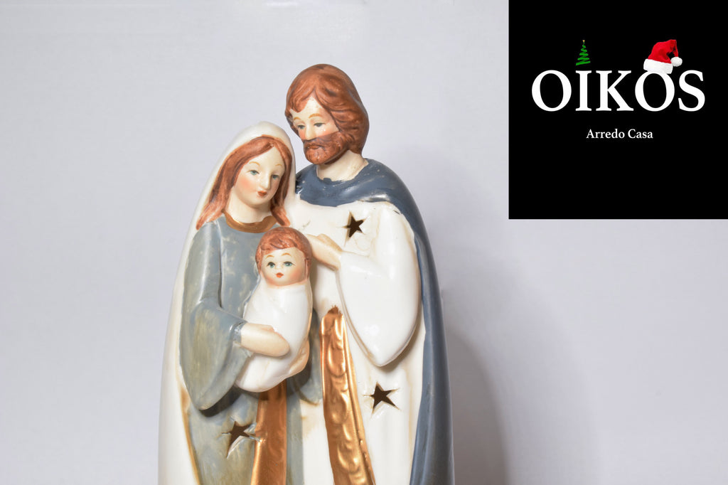 Natività in ceramica h. 19 cm dipinta con fori a stella e lumino interno